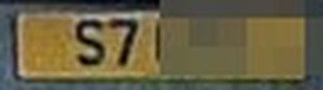 Cropped number plate from the capture, partly blurred